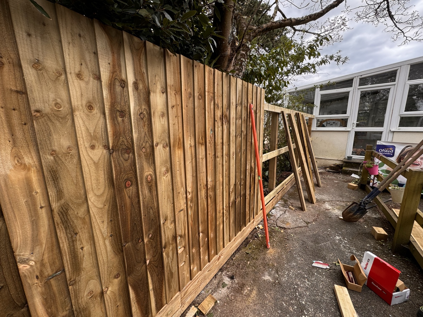 Fence installation in progress